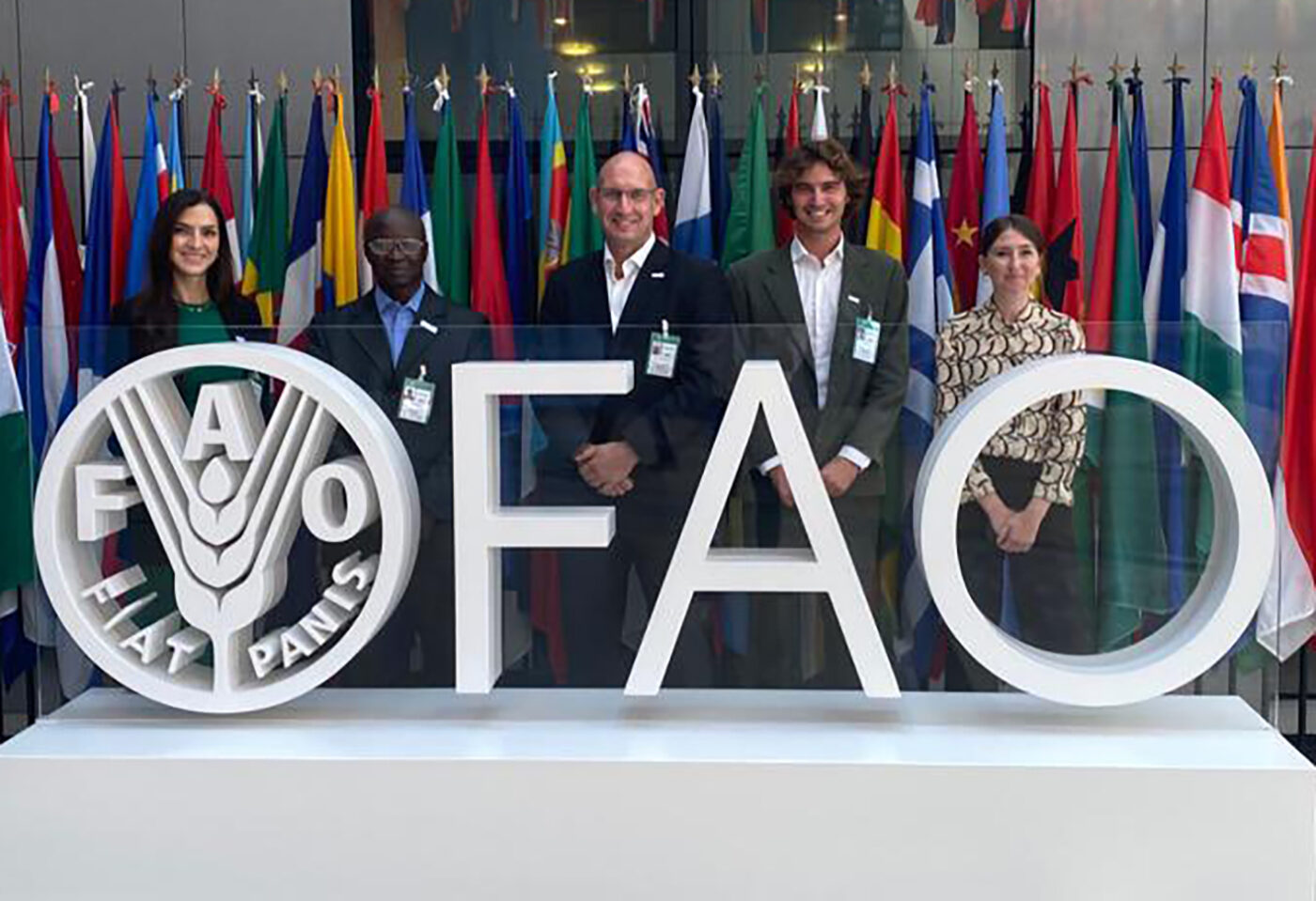Global Fishing Watch staff behind FAO sign